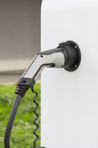 Modern electrical fast charger to electrical or hybrid automobiles. High technology charger fo...